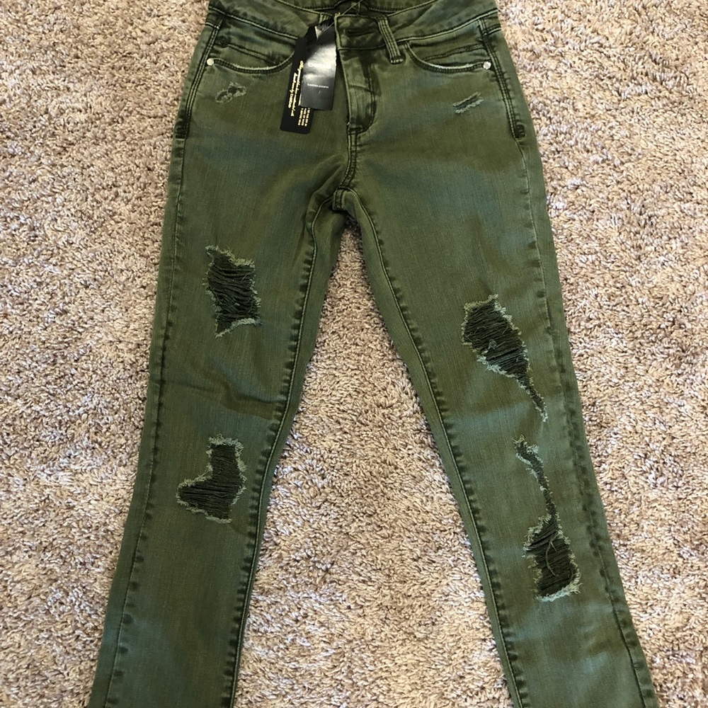 NWT BEBE Heartbreaker jeans size 24